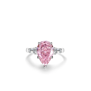 Elegant s925 silver ring featuring a pear-cut pink gemstone and tapered side stones