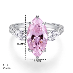 Macro shot of 7 carat marquise pink zircon ring with detailed stone size measurements