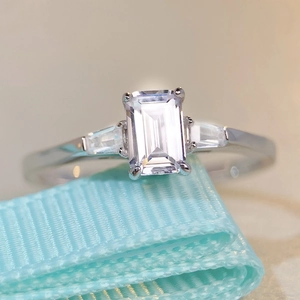 S925 sterling silver ring with radiant cut square zircon on blue textured ribbon