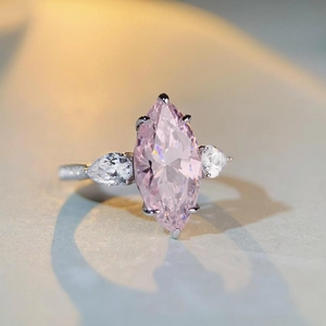 S925 silver ring with a 7ct marquise pink stone and teardrop side crystals