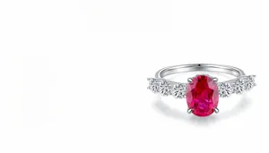 Detailed view of S925 sterling silver ring with 3ct oval ruby and pavé set cubic zirconia