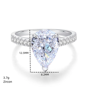 Macro shot of 12.5mm pear cut zircon ring with 925 silver band weighing 3.7g