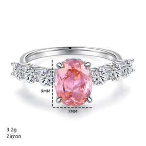 Detail view of pink oval zircon ring showing 9x7mm stone size and 3.2g weight