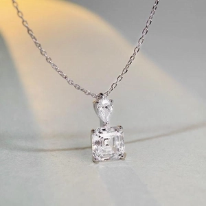 S925 sterling silver necklace featuring pear and square cut high carbon diamond pendant