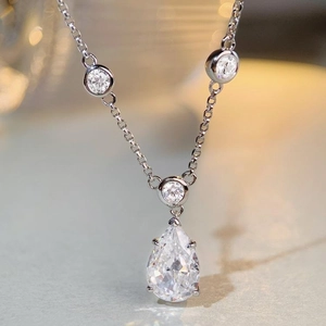 Elegant S925 silver necklace with a pear-cut water drop carbon diamond and round zircons
