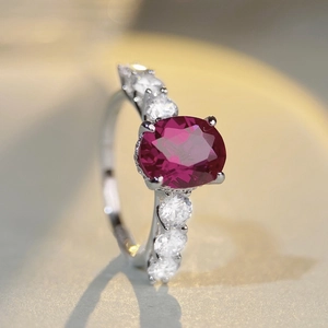 Elegant S925 silver ring with oval ruby gemstone and sparkling side cubic zirconia