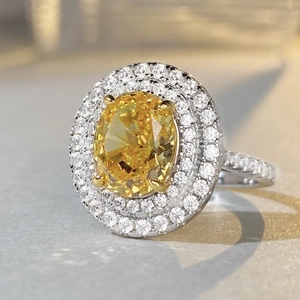 Luxurious S925 silver halo ring with oval yellow crushed ice cut carbon diamond