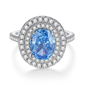 Exquisite S925 silver ring featuring a large oval blue gemstone with halo diamonds