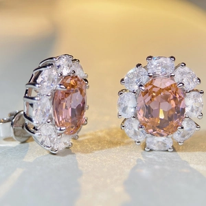 S925 sterling silver flower earrings featuring oval pink sapphire gems and clear zircons