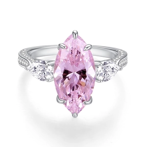 Luxurious marquise cut pink gem ring with side pear stones and pavé set silver band