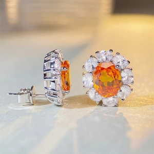 S925 sterling silver flower stud earrings with oval orange gem and zircon halo