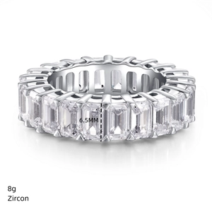 Macro detail of S925 silver eternity ring with 6.5mm emerald cut zircons weighing 8g