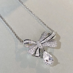 Elegant 925 silver bow necklace featuring teardrop pendant with sparkling cubic zirconia