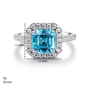 Detailed view of 11.5mm cushion cut blue zircon ring with paved diamond halo setting