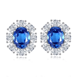 Elegant S925 silver stud earrings with blue sapphire-like gem and white diamonds