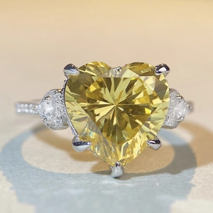 S925 sterling silver ring with heart-cut yellow gem and pear-shaped side stones