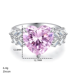 Macro shot of 12.8mm heart-shaped pink zircon ring with detailed size and weight specs
