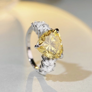 Luxurious S925 sterling silver heart ring featuring a brilliant yellow carbon diamond