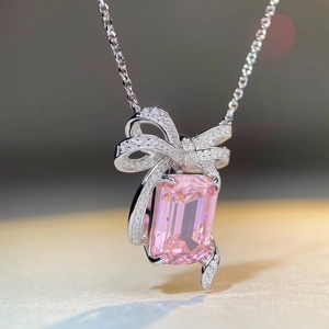 Collier élégant en argent S925 avec pendentif gemme rose et nœud scintillant