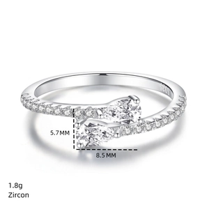 Detail view of S925 silver bypass ring with pear-cut zircon and S925 hallmark