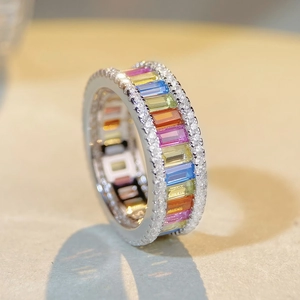 Macro shot of S925 silver ring featuring multicolored rectangular zircons and side diamonds