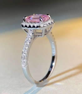 Macro detail of a 2ct pink rectangle diamond ring with halo setting in S925 silver