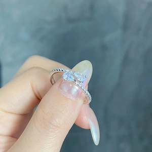Macro shot of S925 sterling silver ring featuring teardrop crystals and pavé detail