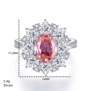 Macro detail of S925 silver ring featuring oval pink zircon with heart halo decoration