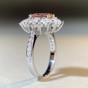 Luxurious S925 silver ring featuring an oval pink sapphire and double diamond halo