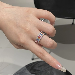 Detailed close-up of S925 silver rainbow ring with colorful zircon stones on hand