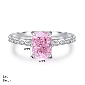 Macro view of 8x6mm pink radiant cut zircon ring with side stones in S925 silver