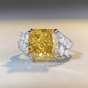 Radiant cut yellow diamond S925 sterling silver ring with sparkling side stones