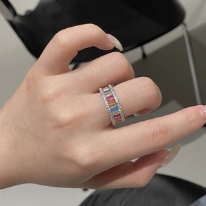Macro detail of S925 sterling silver rainbow ring with colorful zircon and micro diamonds