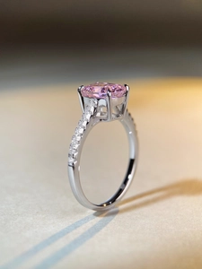 Macro side view of S925 sterling silver ring with radiant cut pink diamond stone