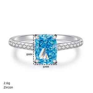 Macro detail of radiant cut light blue zircon ring with 8x6mm stone and 2.6g weight