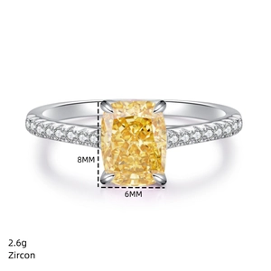 Macro detail of yellow radiant cut zircon ring with 8x6mm stone and 2.6g silver band