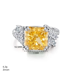 Detailed view of S925 silver ring featuring radiant yellow zircon and marquise side stones