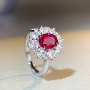 S925 sterling silver ring with large oval ruby and sunflower halo of sparkling zircons