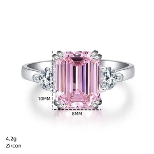 Detail of 4.2g silver ring with 10x8mm emerald cut pink zircon and side stones