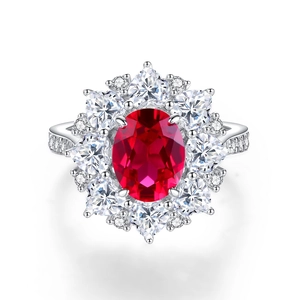 S925 sterling silver ring with oval ruby and sunburst halo of white zircon stones