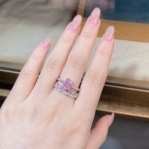Close-up of S925 silver ring with radiant cut pink diamond on a model's hand