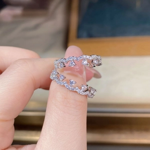 Macro view of double layer wavy lace S925 silver ring with sparkling white zircons