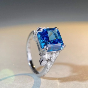 Luxurious S925 silver ring featuring a large square blue sapphire with marquise side diamonds