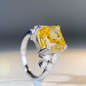 Elegant S925 sterling silver ring with radiant cut yellow diamond and side stone accents