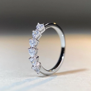 Elegant S925 sterling silver ring with seven sparkling heart-shaped cubic zirconia stones