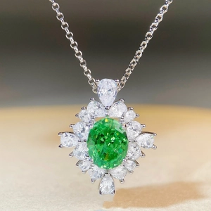 S925 silver emerald pendant necklace with oval green gemstone and floral zirconia clusters