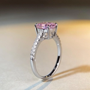 Elegant S925 sterling silver ring with radiant cut pink diamond and pavé side stones