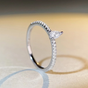 Elegant S925 sterling silver ring with pear-cut zircon and pave-set diamonds detail
