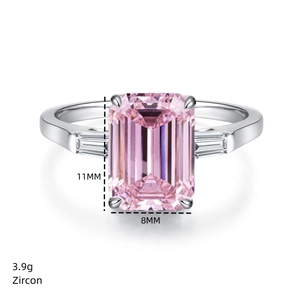 Macro detail of emerald cut pink zircon ring with 8x11mm stone size and silver band