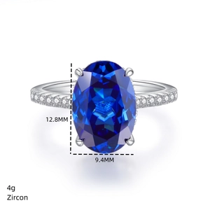 Detail view of oval blue sapphire ring with 12.8mm stone size and 4g weight specs